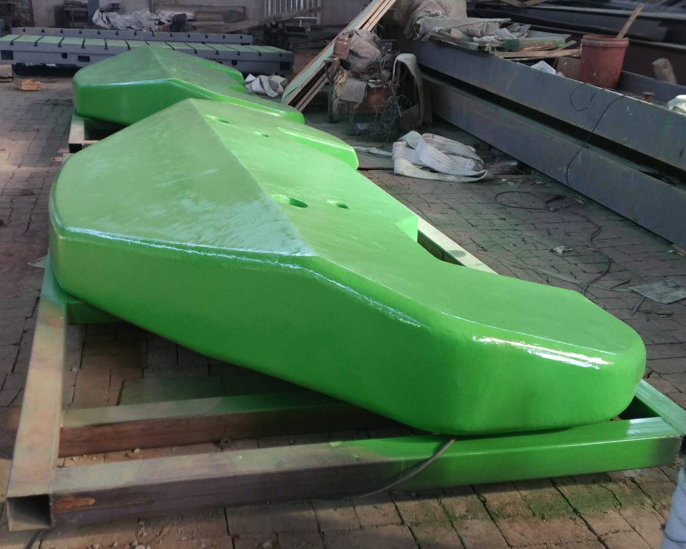 Green painted heavy casting side view
