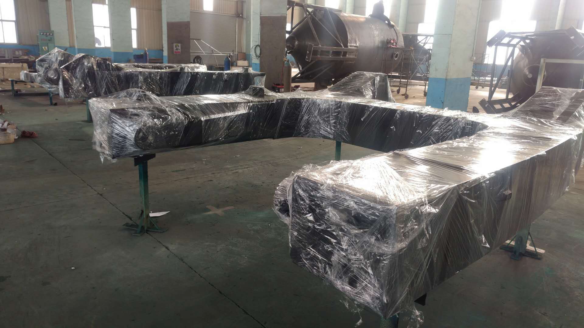 Steel structure wrapped for shipping